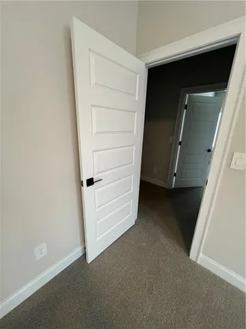 a bathroom with a tub and a shower
