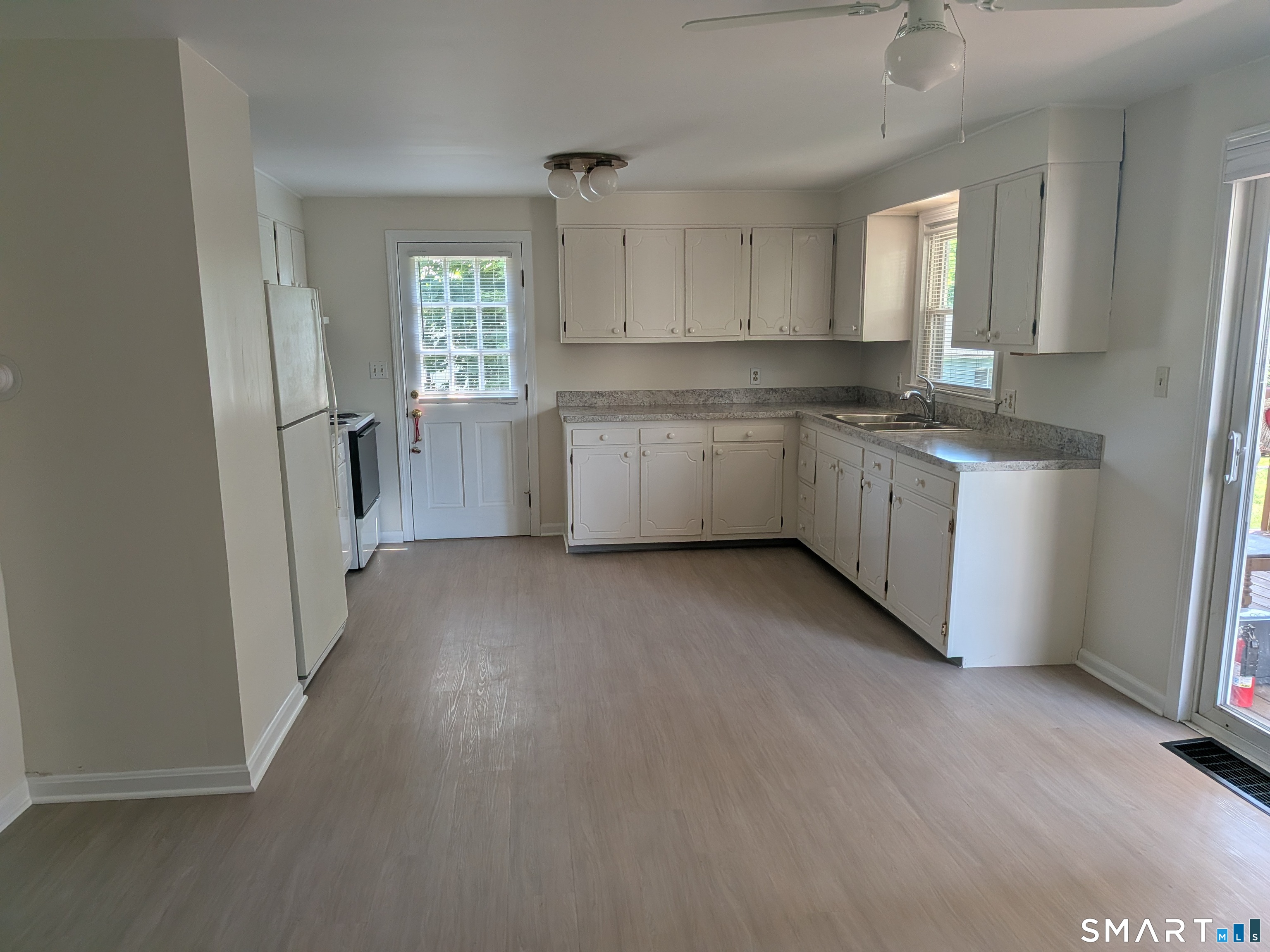 124 Spring Lake Road Waterbury, CT 06706 - Photo 8 of 34 Long view of the entire kitchen.