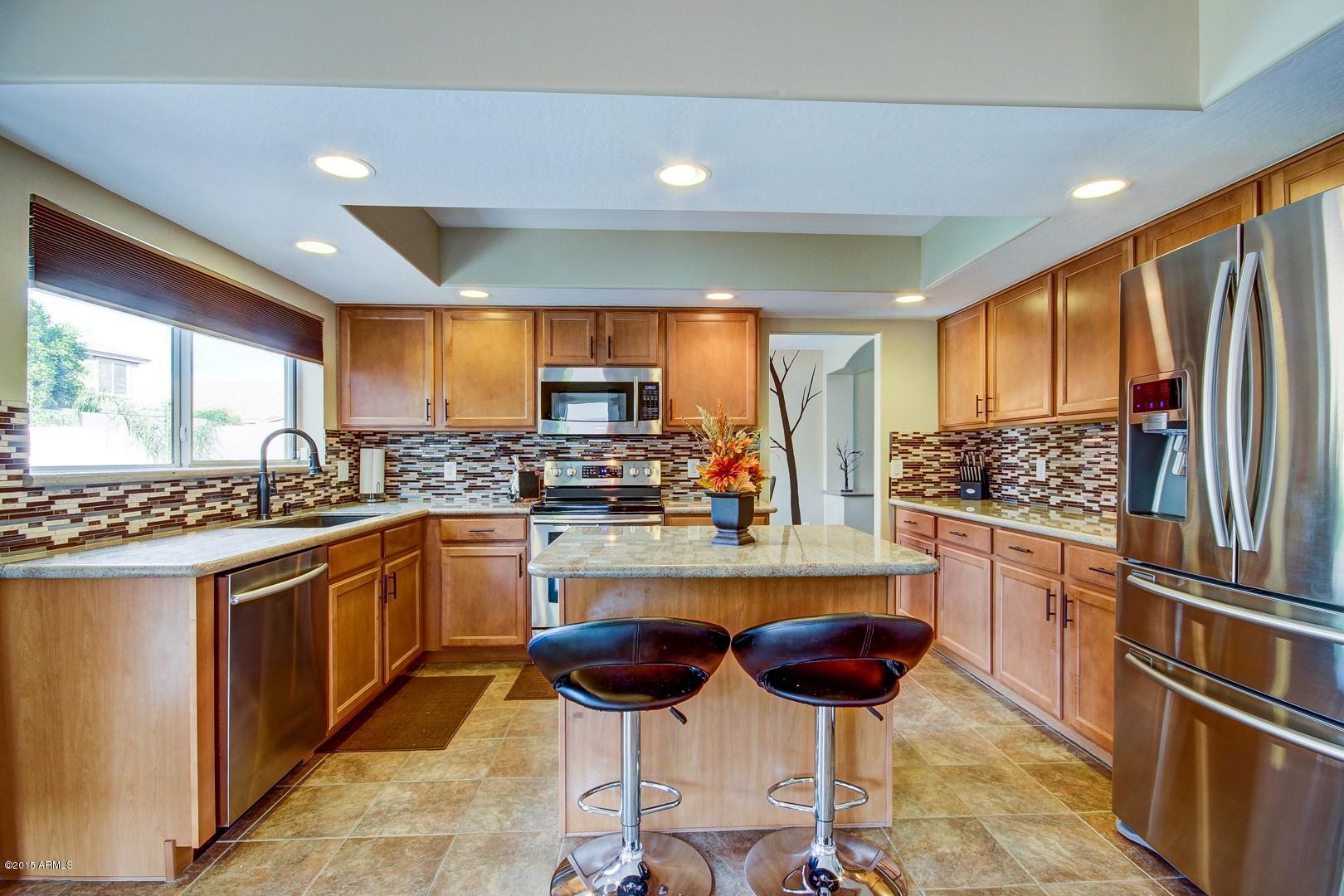 15840 West Calavar Road Surprise, AZ 85379 - Photo 4 of 51 large open kitchen