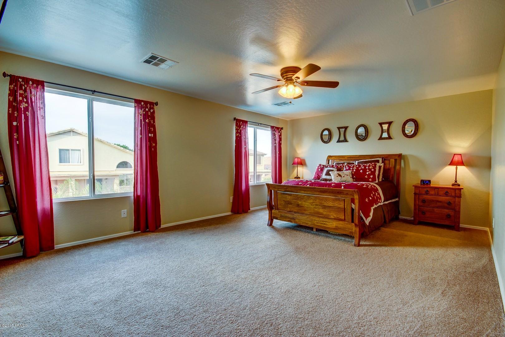 15840 West Calavar Road Surprise, AZ 85379 - Photo 5 of 51 masterbedroom