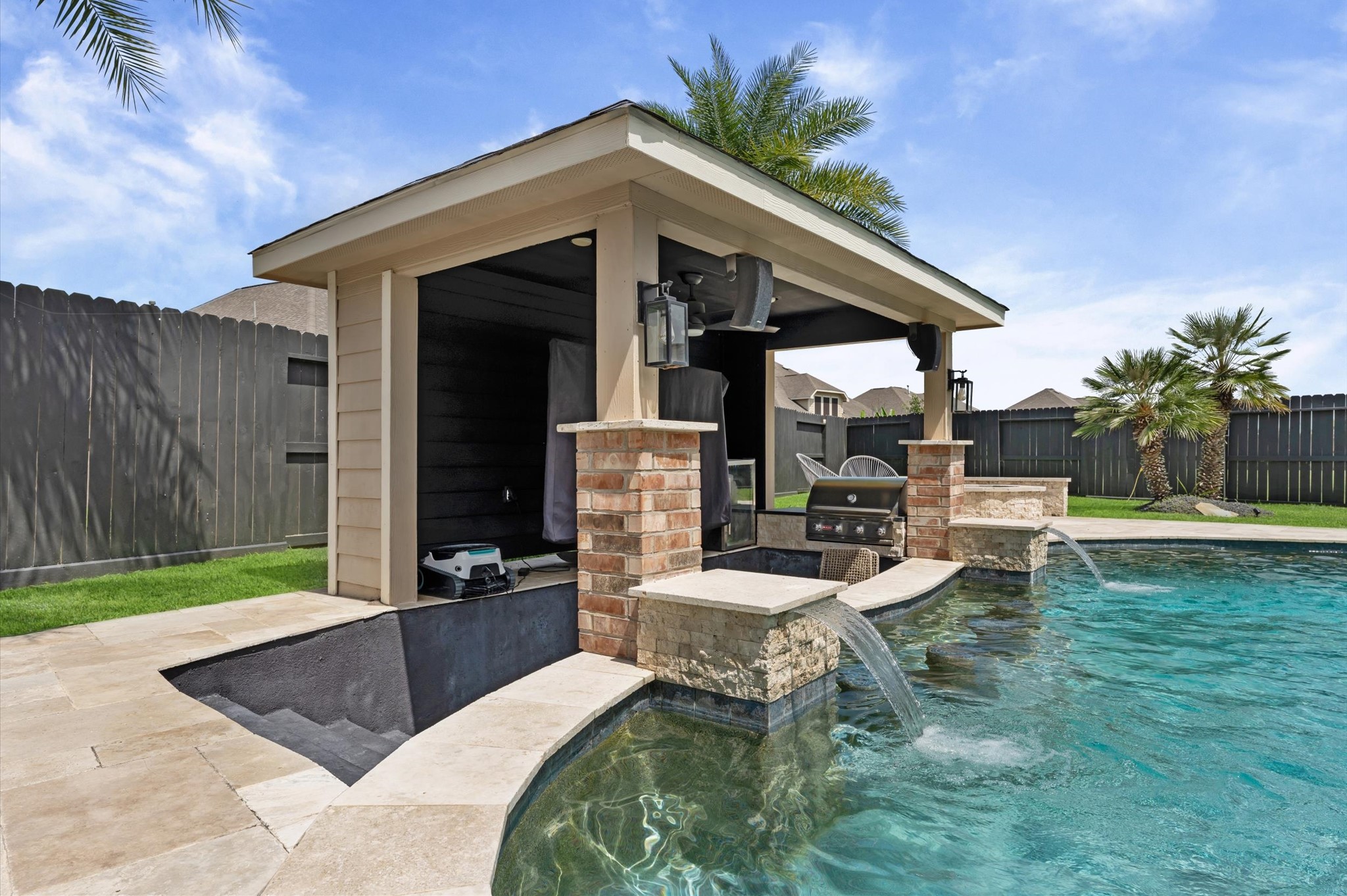 14016 Savannah Landing Lane Rosharon, TX 77583 - Photo 42 of 49 a view of a chair and table in backyard of the house