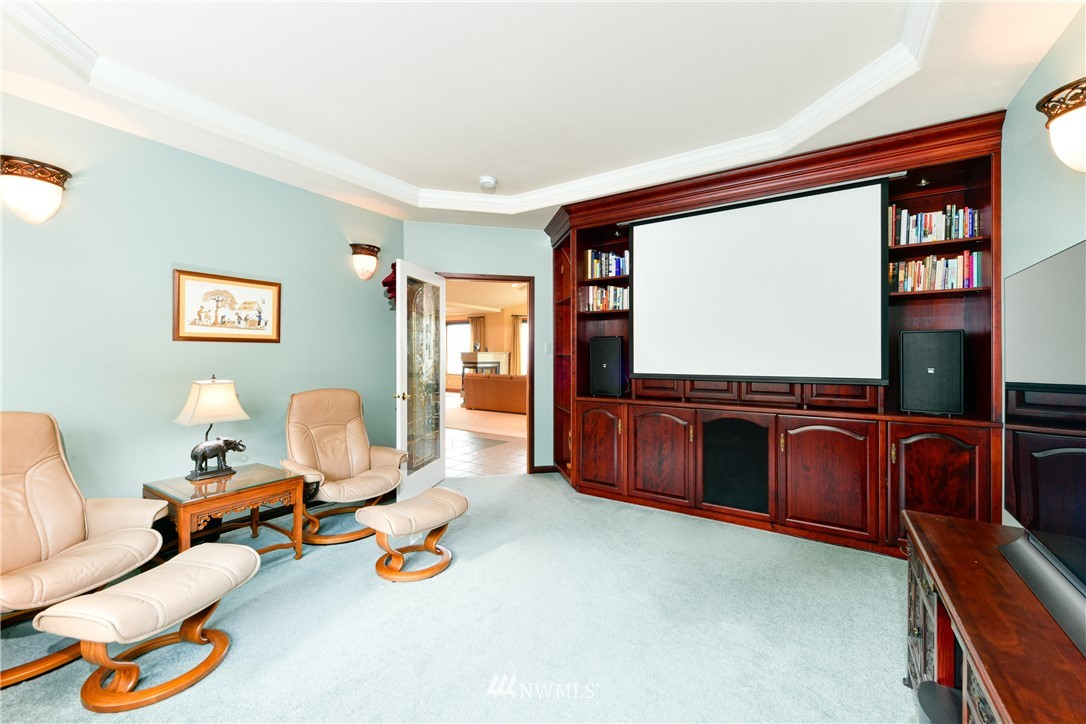 4203 Mitchell Drive Anacortes, WA 98221 - Photo 16 of 38 a living room with furniture and a flat screen tv