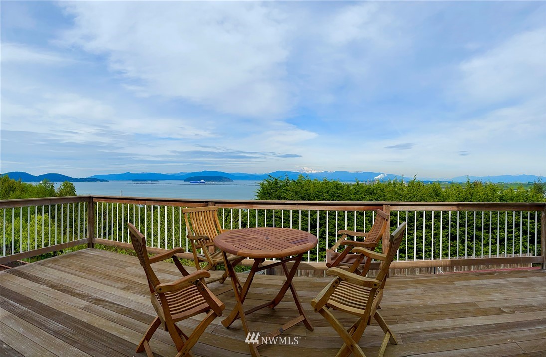 4203 Mitchell Drive Anacortes, WA 98221 - Photo 35 of 38 a view of a chairs on wooden deck