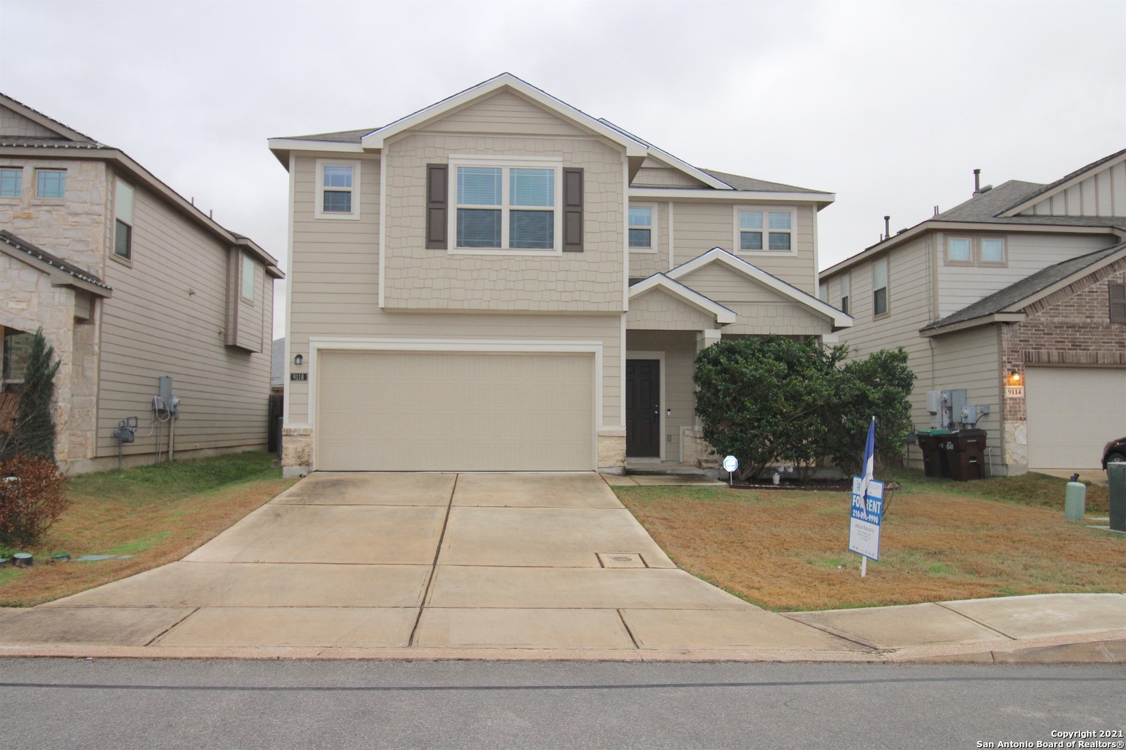 9118 Hogarten Converse, TX 78109 - Photo 1 of 26 a front view of a house with garage