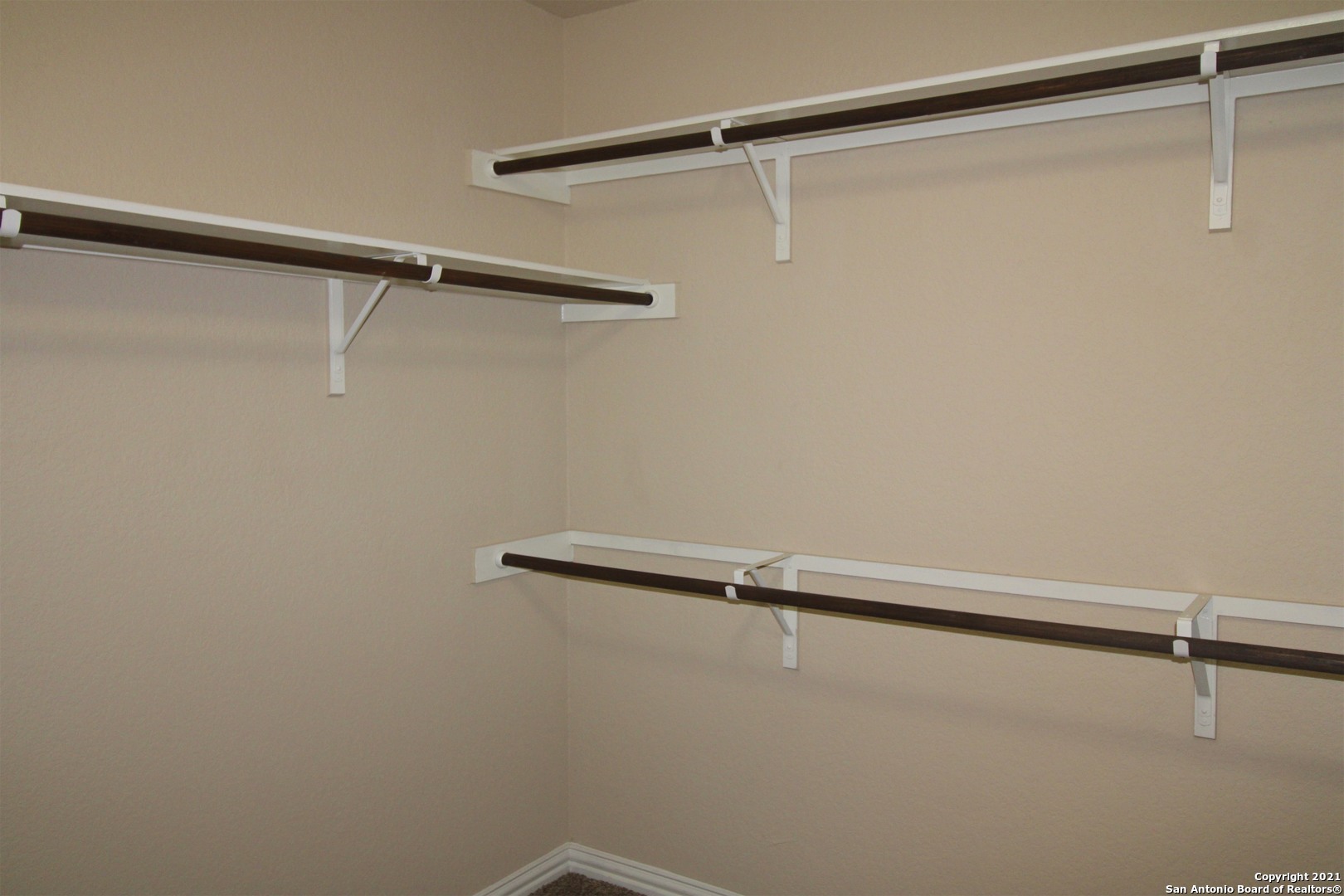 9118 Hogarten Converse, TX 78109 - Photo 18 of 26 a close up view of a rack on the wall