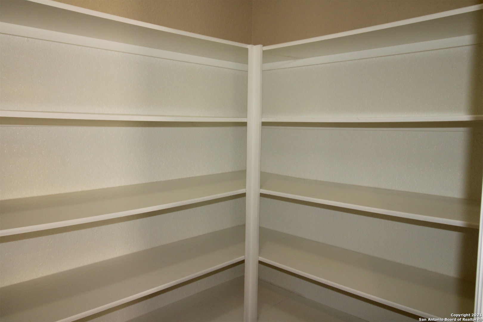 9118 Hogarten Converse, TX 78109 - Photo 7 of 26 a view of an empty walk in closet