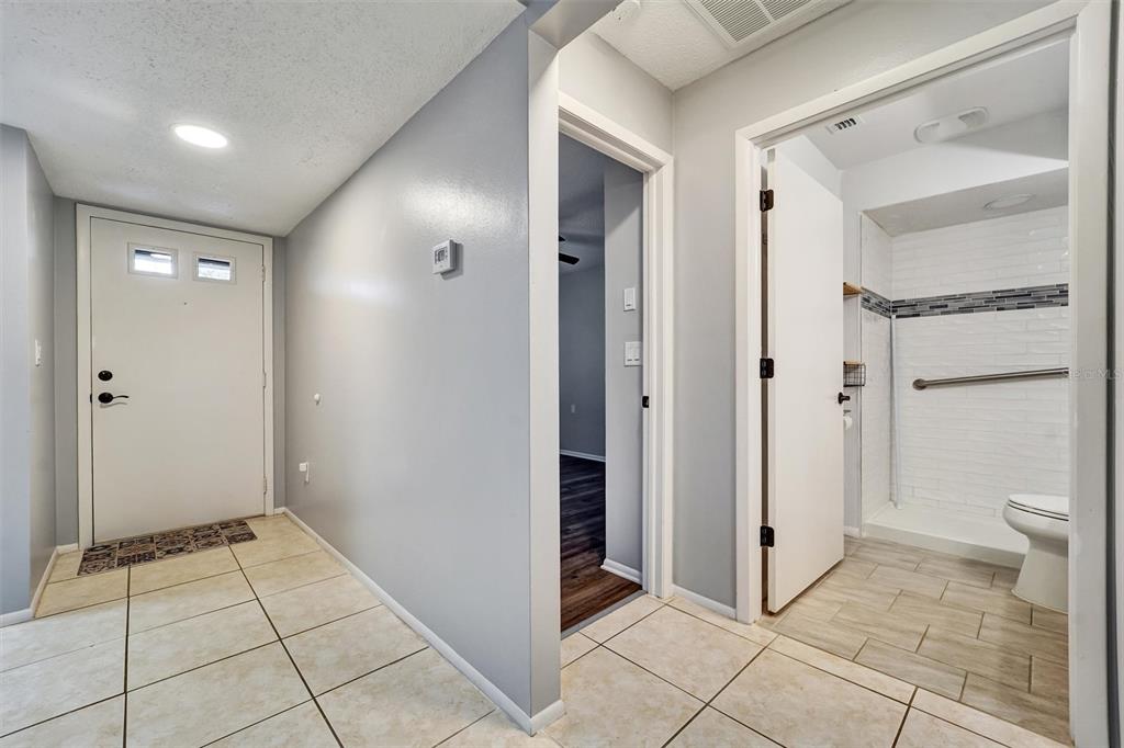 8330 High Point Circle, Unit 6 Port Richey, FL 34668 - Photo 15 of 28 a view of a bathroom with mirror