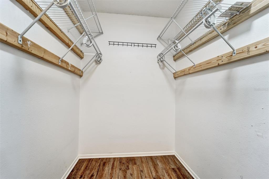8330 High Point Circle, Unit 6 Port Richey, FL 34668 - Photo 23 of 28 a view of a room with rack on the wall