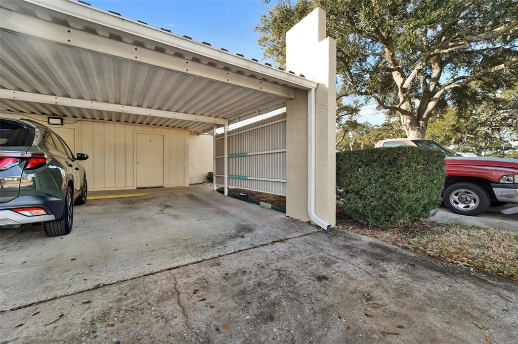 8330 High Point Circle, Unit 6 Port Richey, FL 34668 - Photo 27 of 28 a view of car garage