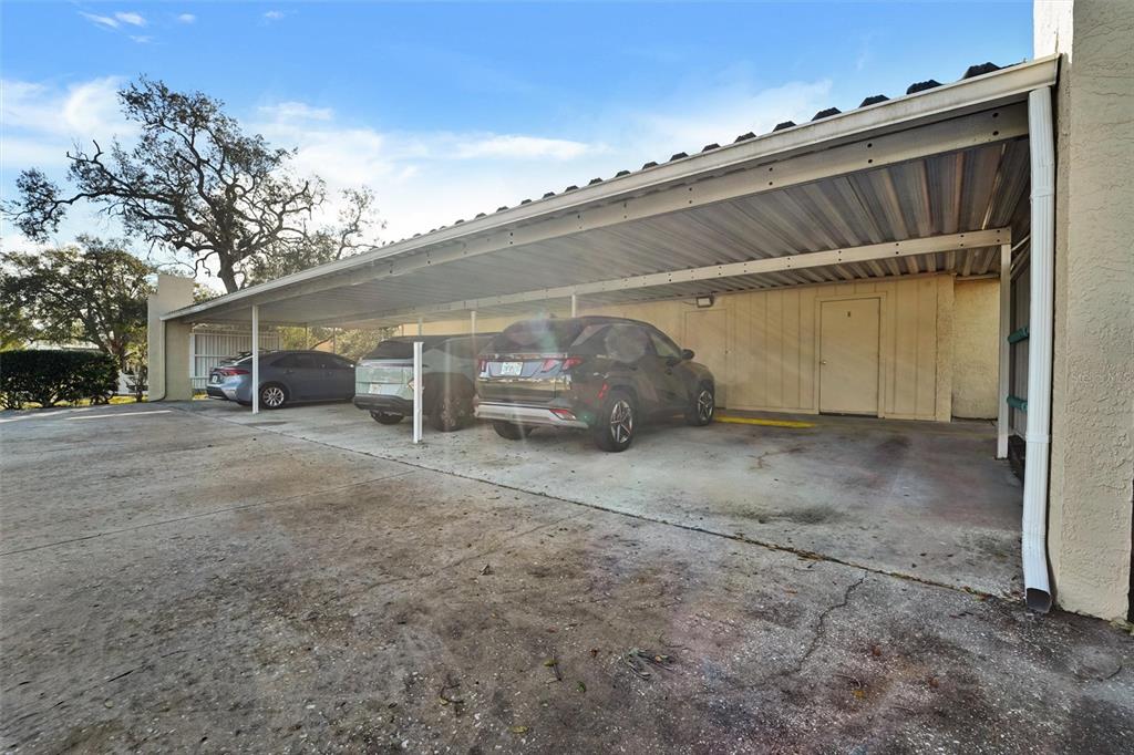 8330 High Point Circle, Unit 6 Port Richey, FL 34668 - Photo 28 of 28 a view of a car garage
