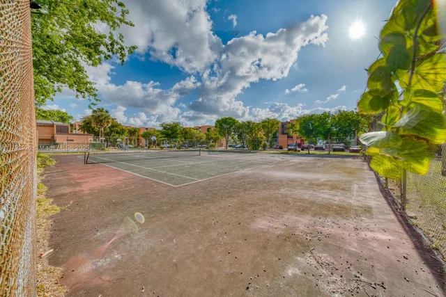 a view of street with parked cars