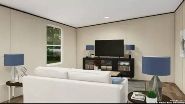 a living room with furniture and a flat screen tv