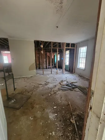 a view of a livingroom with furniture and window