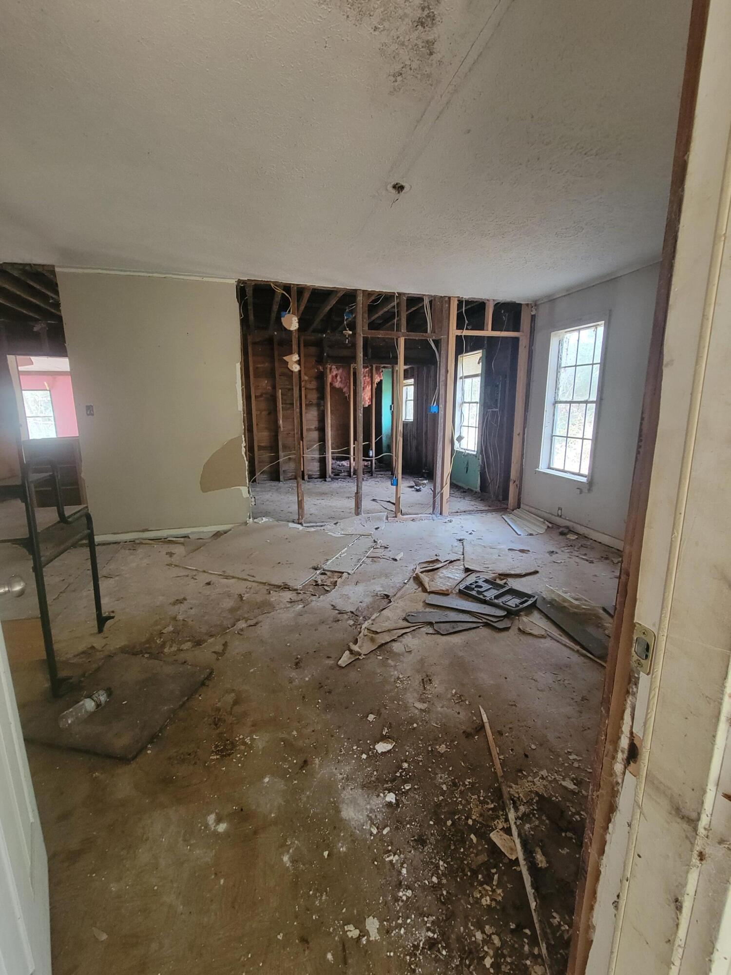 228 Double Bridge Road Laurel Hill, FL 32567 - Photo 8 of 23 a view of a livingroom with furniture and window