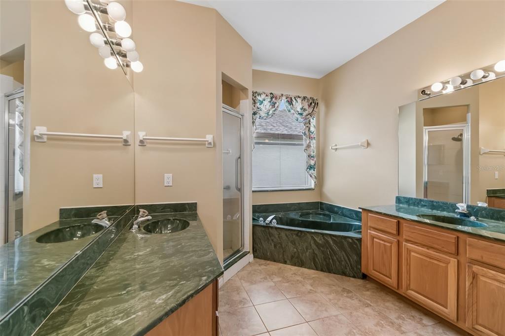 10118 Shortwood Lane Orlando, FL 32836 - Photo 22 of 53 a kitchen with a sink and a stove top oven