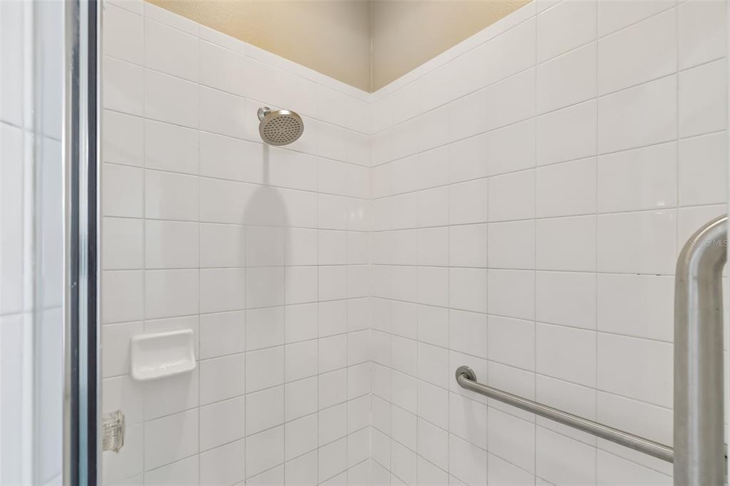 10118 Shortwood Lane Orlando, FL 32836 - Photo 26 of 53 a bathroom with a shower