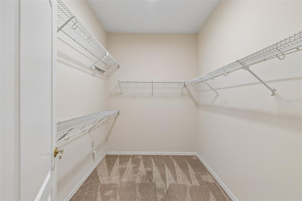 10118 Shortwood Lane Orlando, FL 32836 - Photo 28 of 53 a view of a room with racks on the wall