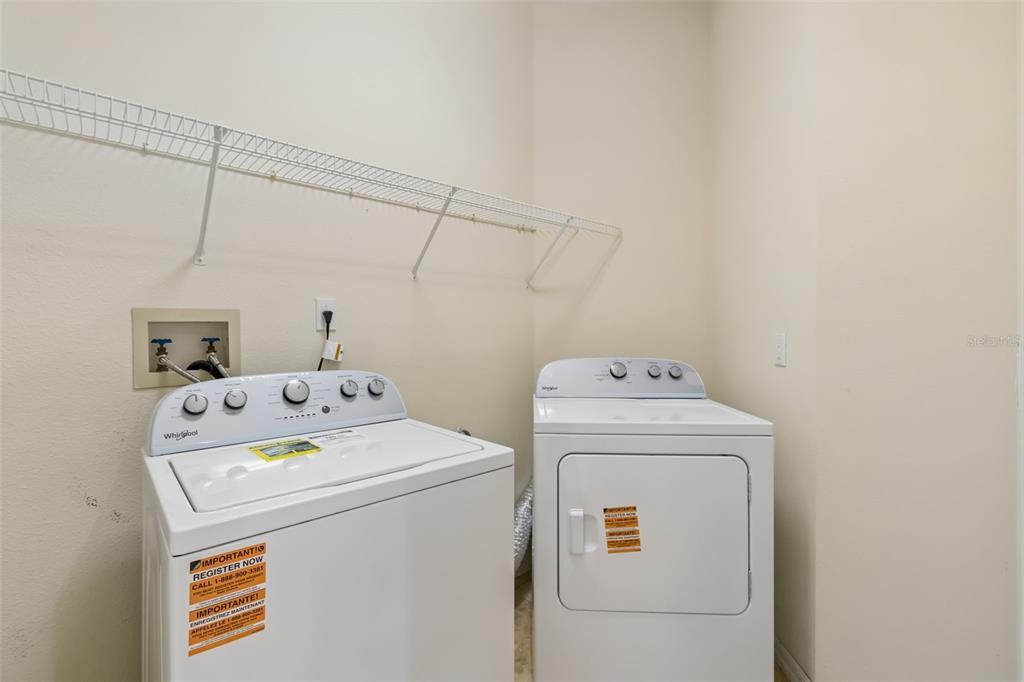 10118 Shortwood Lane Orlando, FL 32836 - Photo 38 of 53 a utility room with dryer and washer