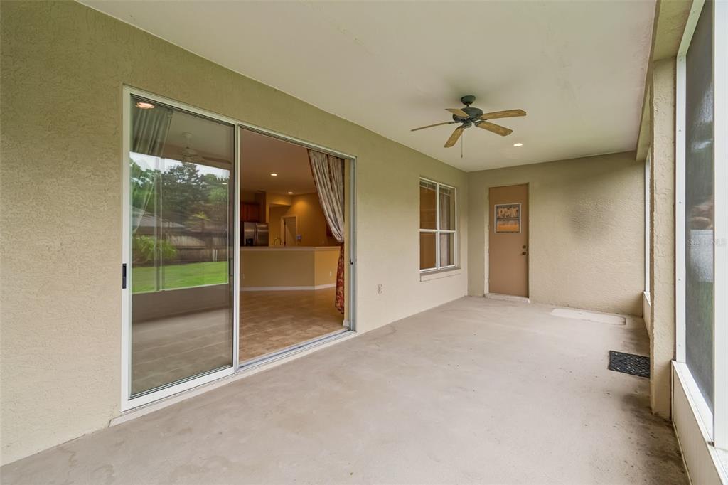 10118 Shortwood Lane Orlando, FL 32836 - Photo 40 of 53 a view of empty room with floor to ceiling window