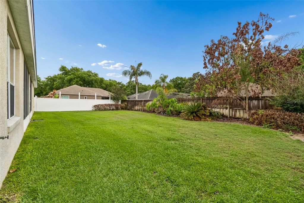 10118 Shortwood Lane Orlando, FL 32836 - Photo 43 of 53 a view of an outdoor space and a yard