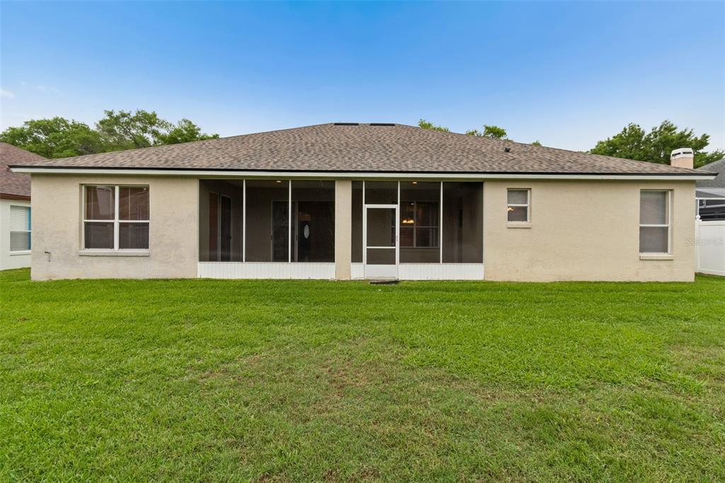 10118 Shortwood Lane Orlando, FL 32836 - Photo 45 of 53 front view of a house with a yard