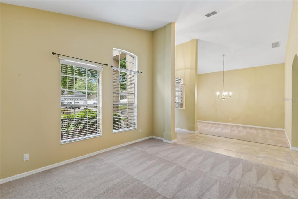 10118 Shortwood Lane Orlando, FL 32836 - Photo 5 of 53 a view of an empty room with a window