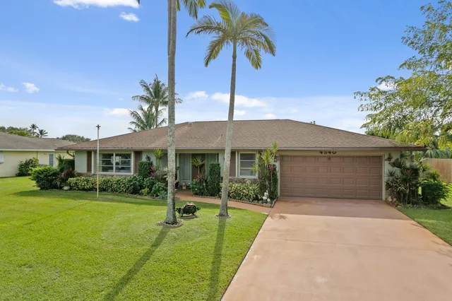 a house view with a garden space