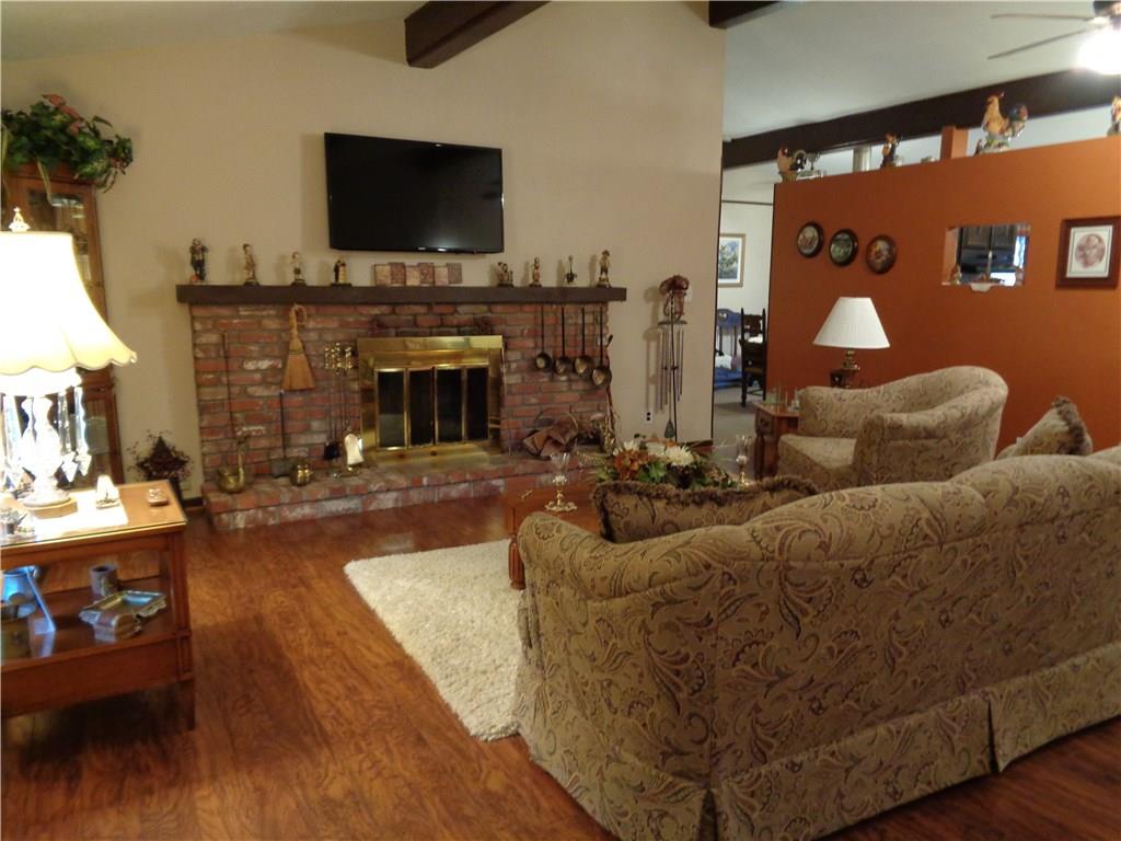 321 Spring Road Belle Vernon, PA 15012 - Photo 4 of 25 LIVING ROOM WITH WOODBURNING FIREPLACE