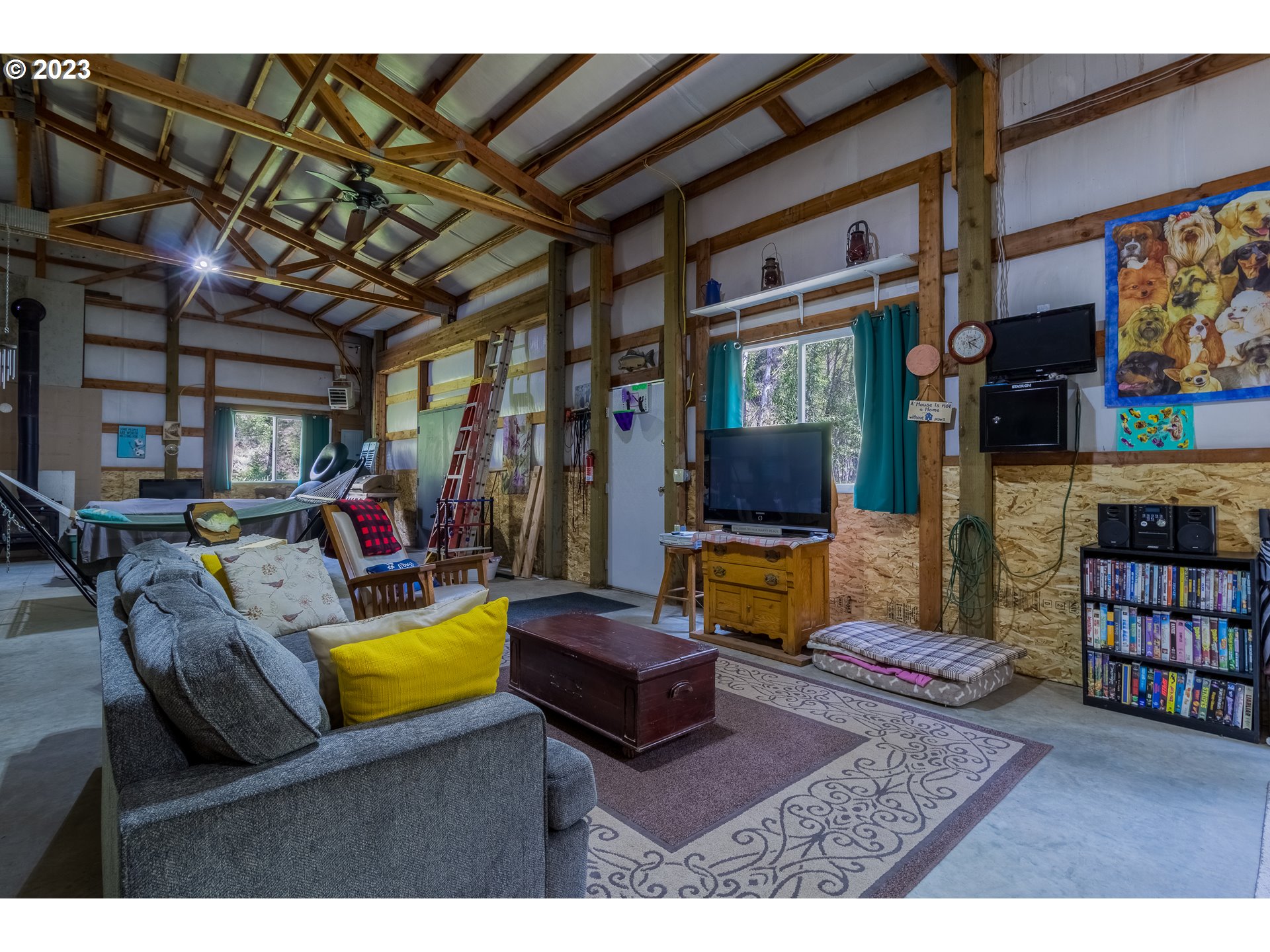 61174 Mill Creek Road Milton Freewater, OR 97862 - Photo 15 of 25 a living room with furniture and a flat screen tv
