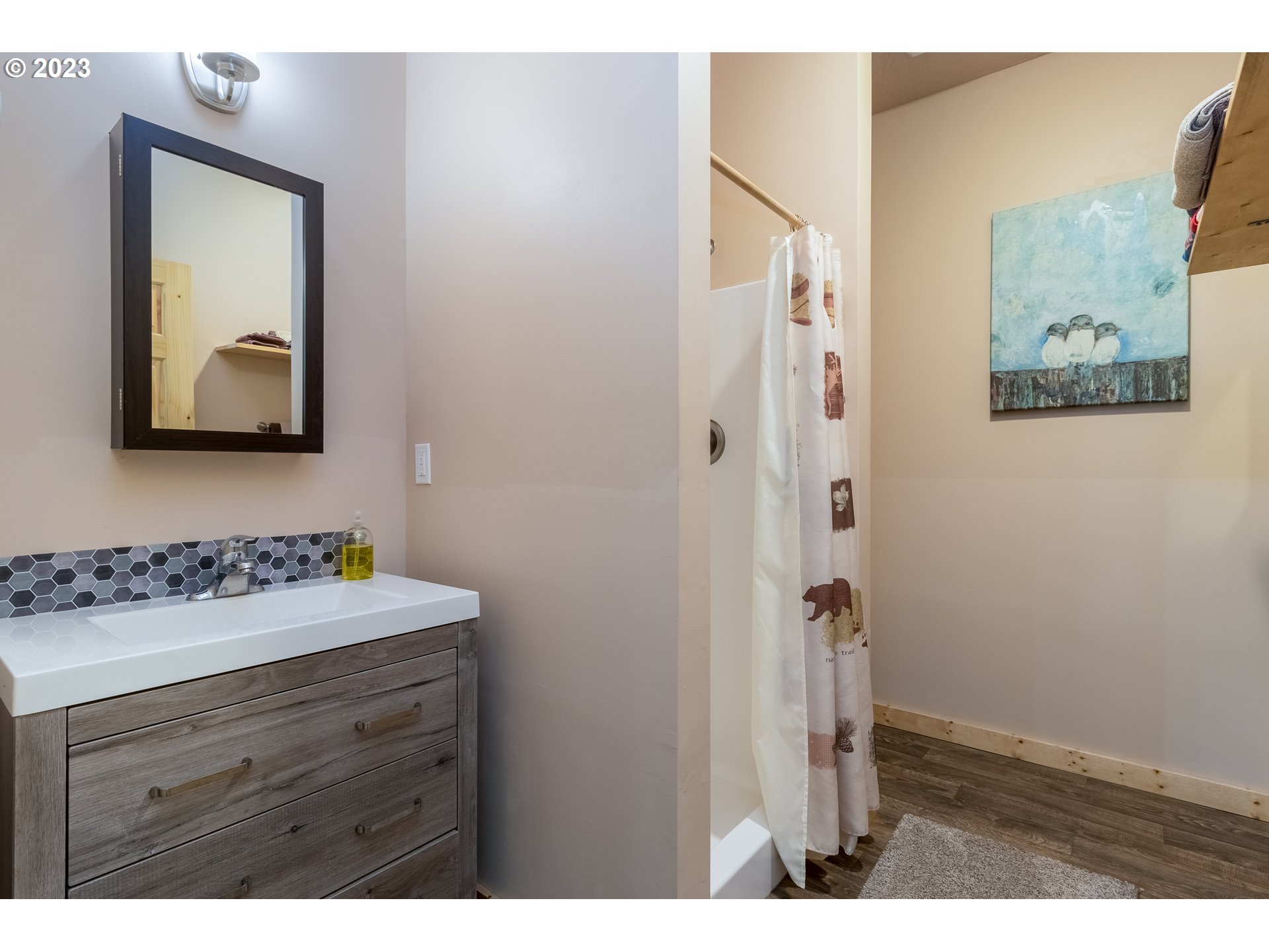 61174 Mill Creek Road Milton Freewater, OR 97862 - Photo 19 of 25 a bathroom with a sink mirror and vanity