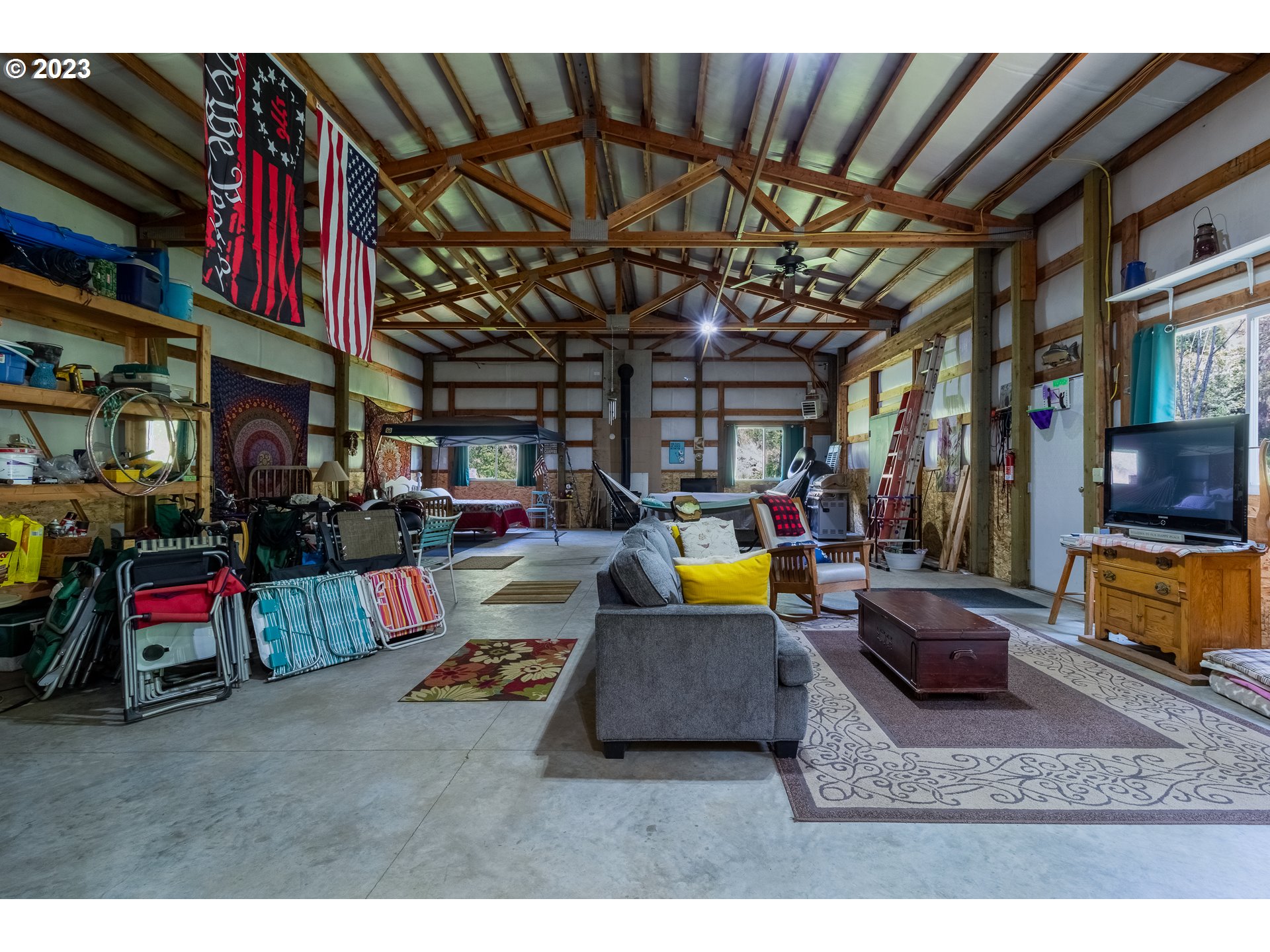 61174 Mill Creek Road Milton Freewater, OR 97862 - Photo 10 of 25 a living room with lots of furniture and a flat screen tv