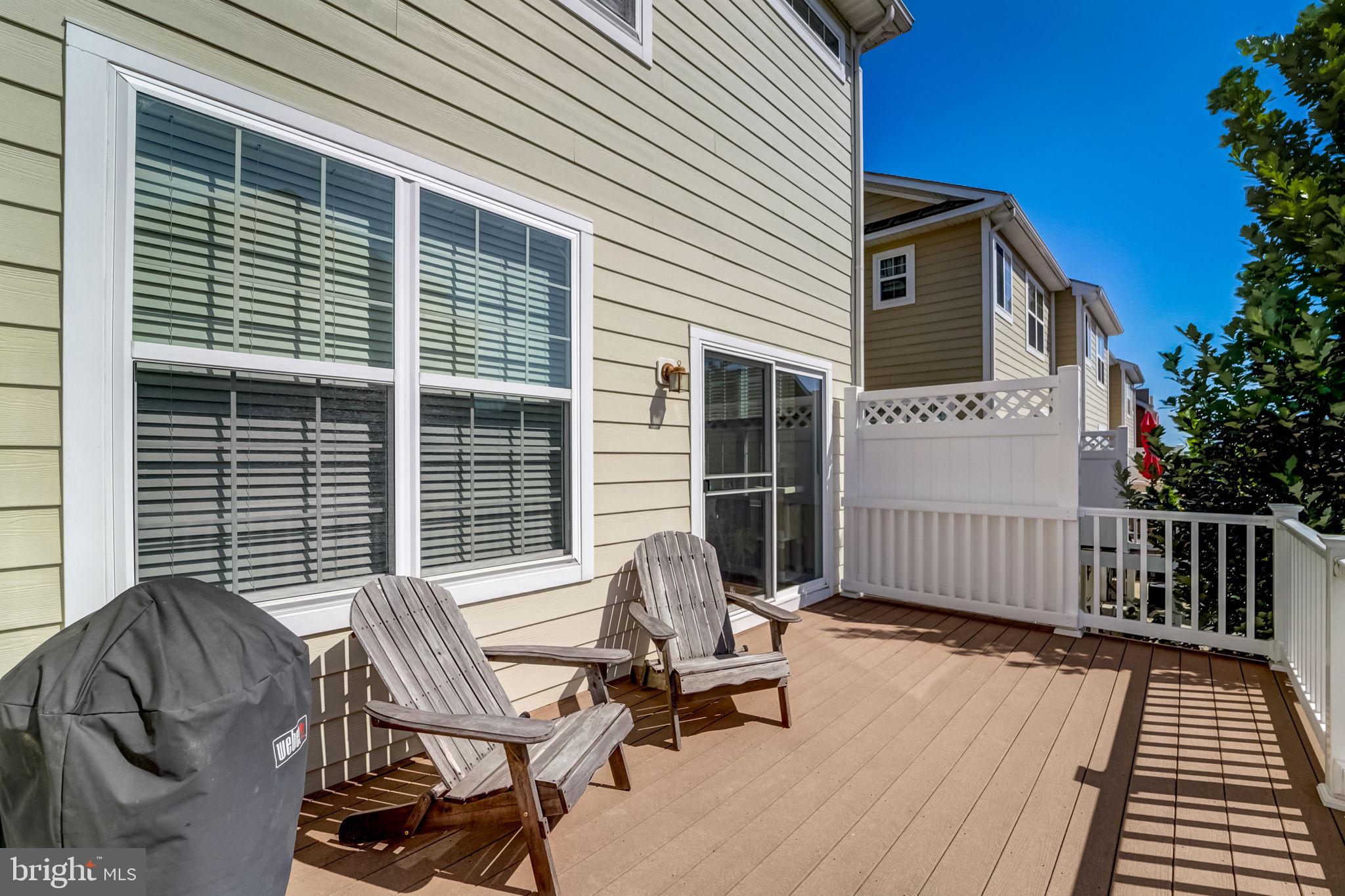 2558 Cherry Tree Road Hanover, MD 21076 - Photo 29 of 37 a view of a patio with a table and chairs