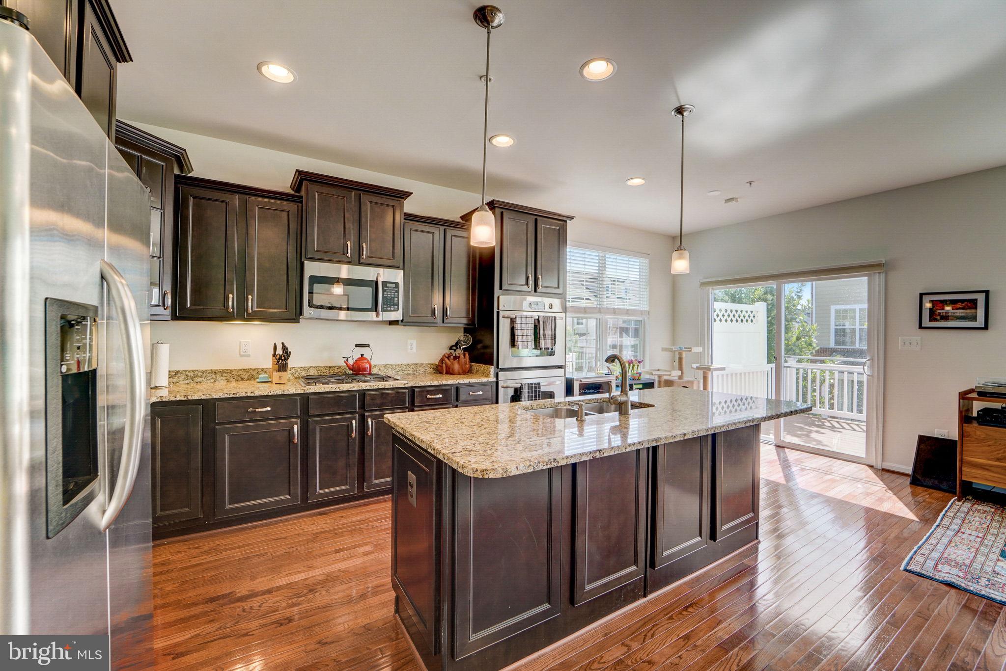 2558 Cherry Tree Road Hanover, MD 21076 - Photo 9 of 37 a large kitchen with lots of counter space