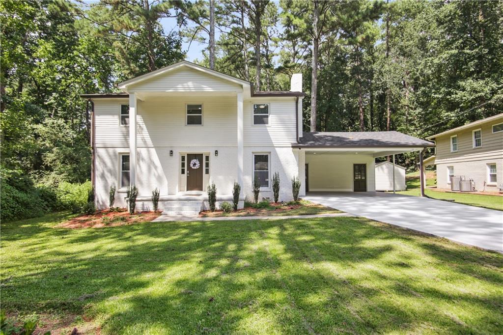 2832 Riderwood Drive Decatur, GA 30033 - Photo 1 of 1 a front view of a house with a yard
