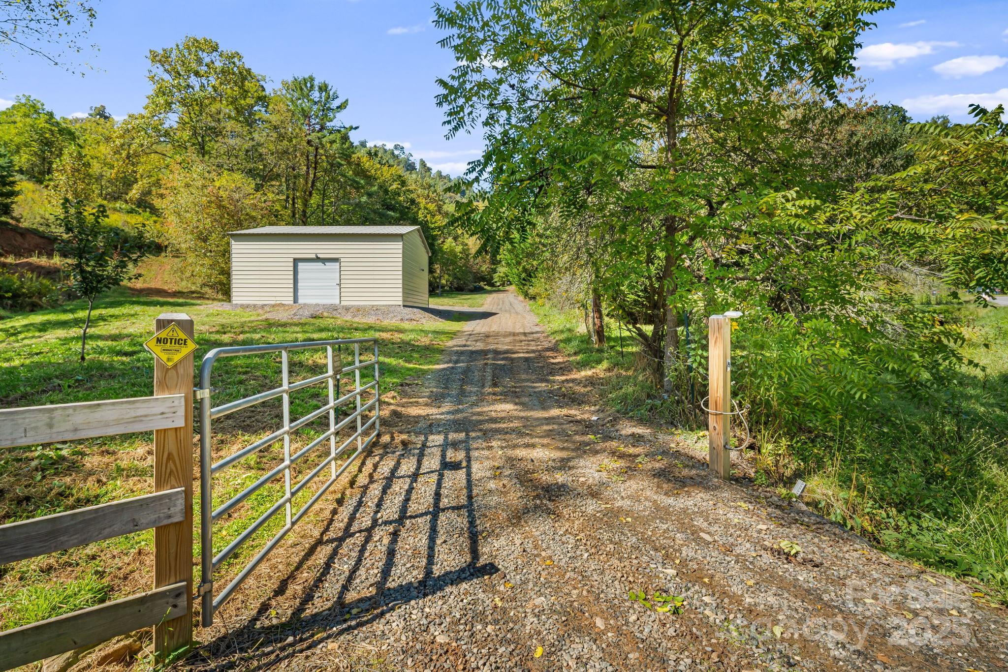 a view of a chairs and table on the wooden deck