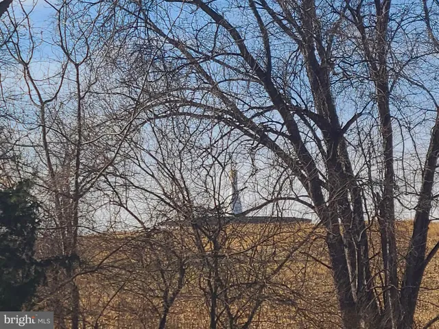 a view of lake and mountain