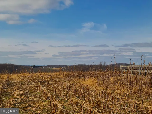 a view of mountain with lake view