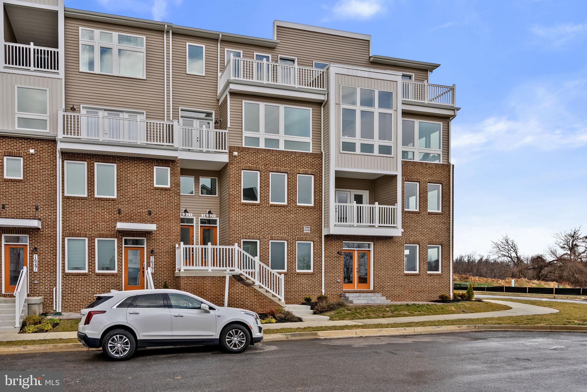 1631 Blacksmith Way, Unit 214B Frederick, MD 21702 - Photo 2 of 41 a building view