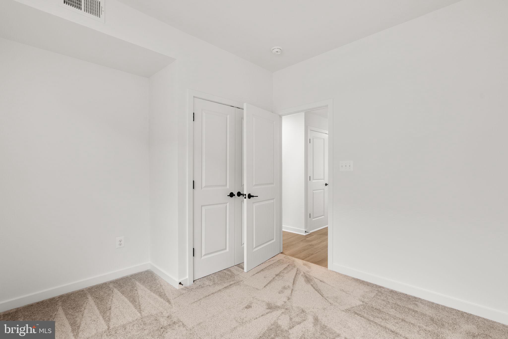 1631 Blacksmith Way, Unit 214B Frederick, MD 21702 - Photo 31 of 41 a view of an empty room