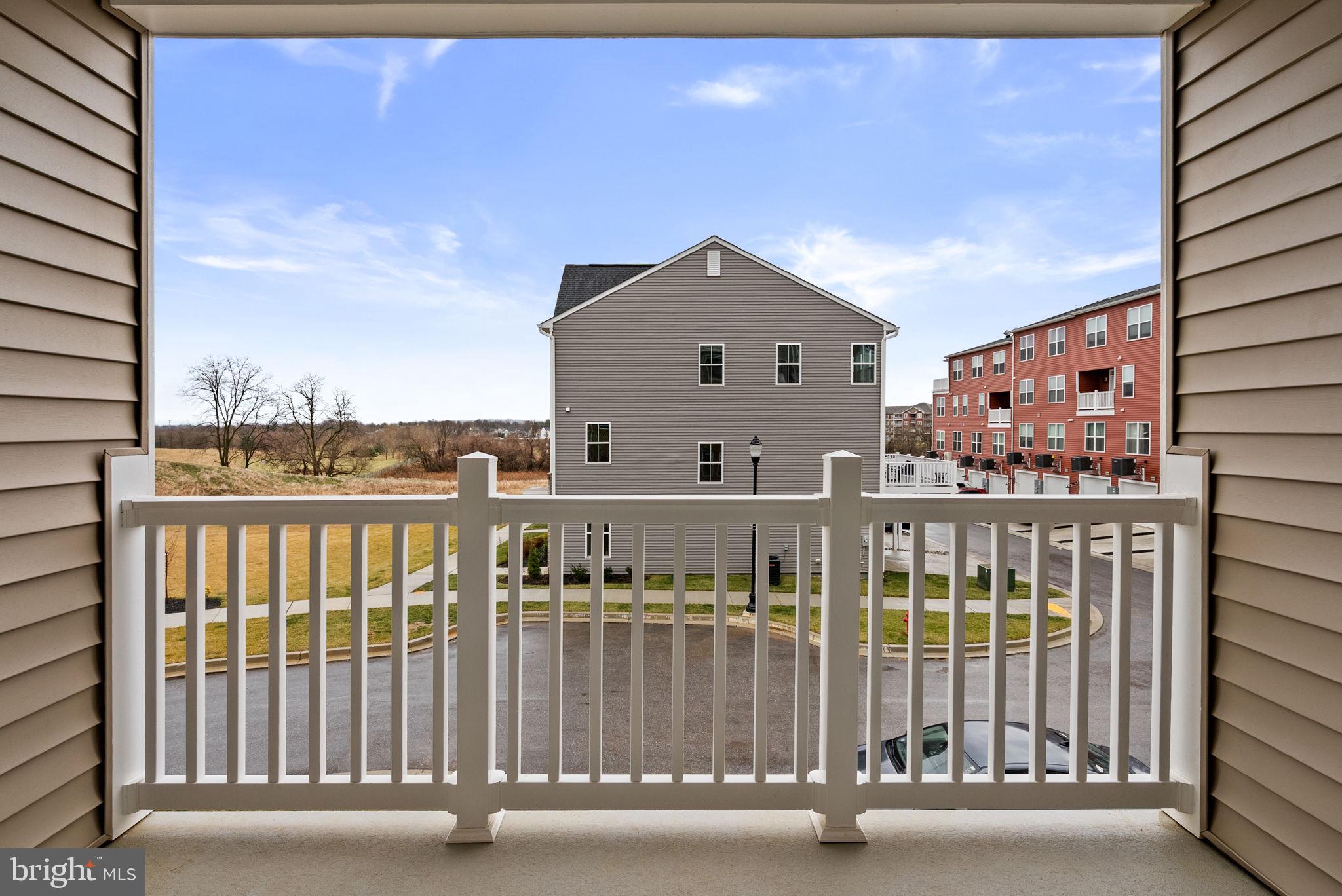 1631 Blacksmith Way, Unit 214B Frederick, MD 21702 - Photo 35 of 41 a view of a balcony with city view
