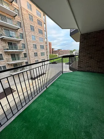 a view of a back yard from a balcony