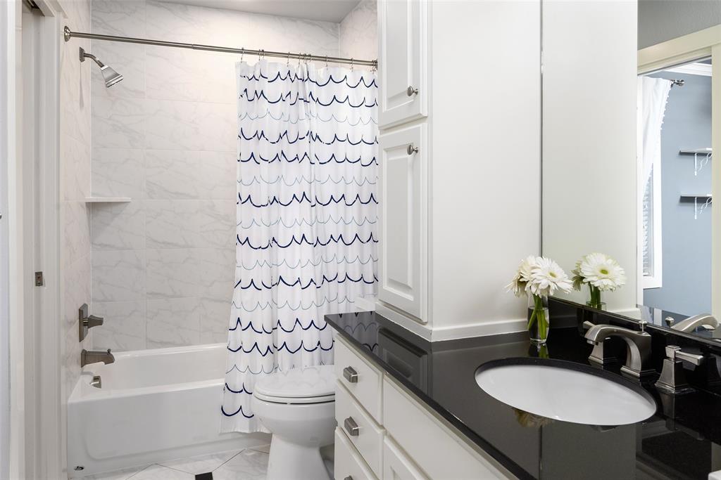 3935 Dunhaven Road Dallas, TX 75220 - Photo 28 of 38 Jack and Jill Bathroom
