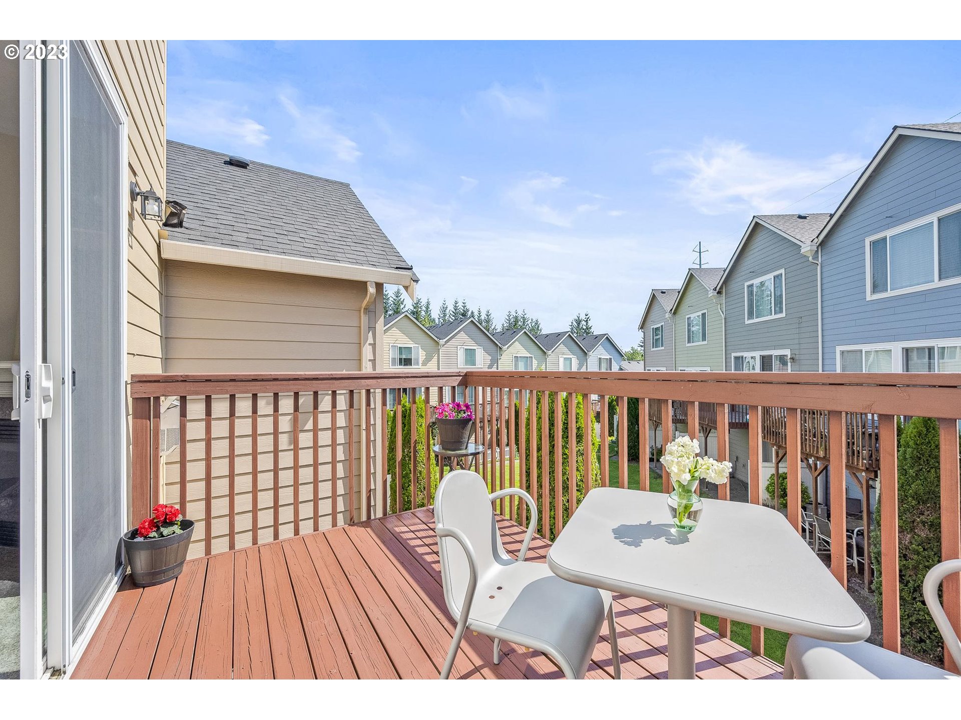 2830 Northeast Blossom Hill Road Fairview, OR 97024 - Photo 11 of 34 a view of balcony with wooden floor and seating space