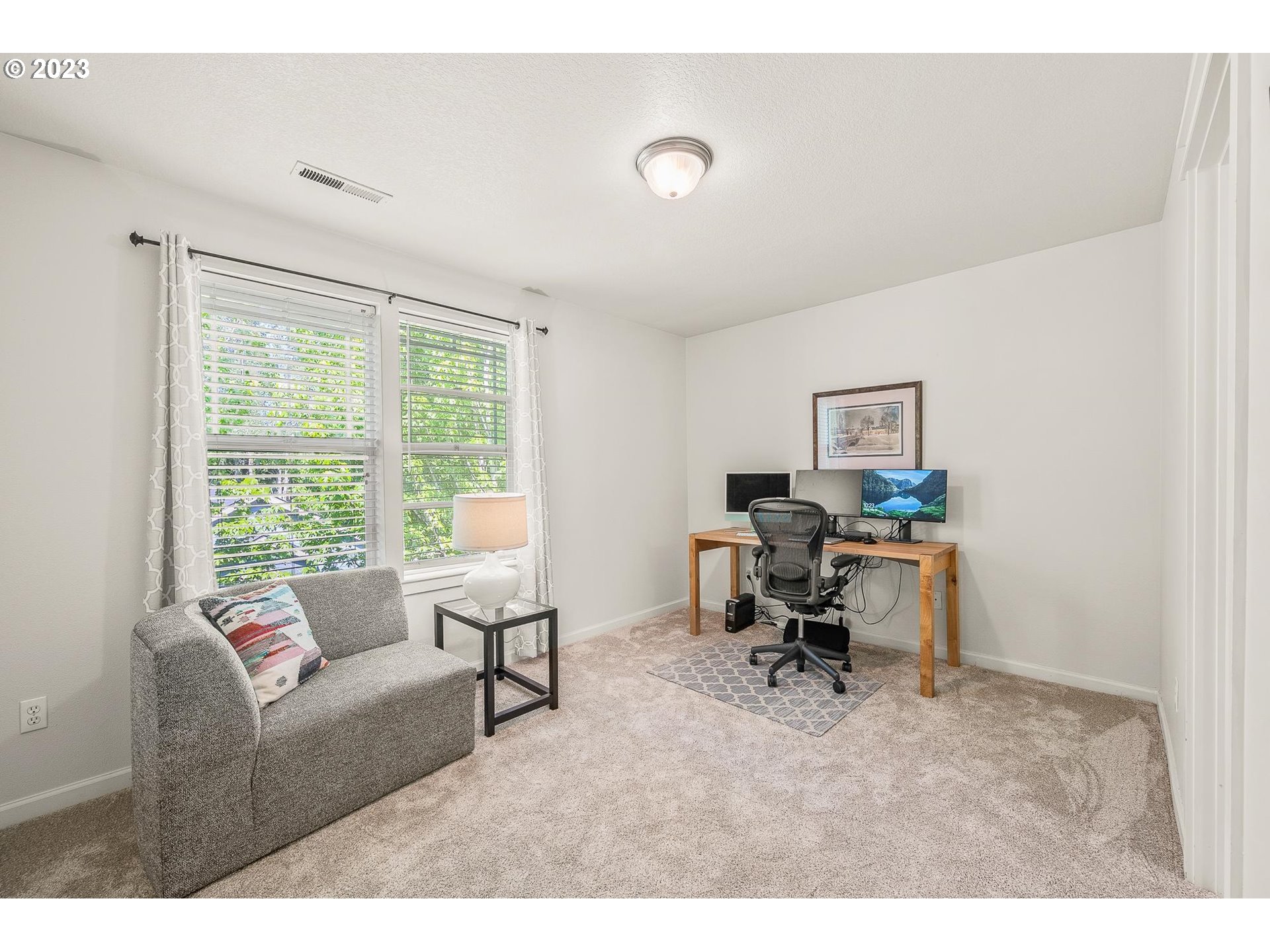 2830 Northeast Blossom Hill Road Fairview, OR 97024 - Photo 14 of 34 a living room with furniture and a window