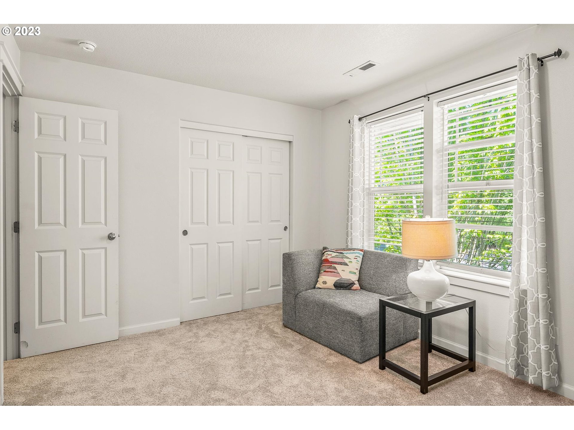 2830 Northeast Blossom Hill Road Fairview, OR 97024 - Photo 17 of 34 a living room with furniture and a window