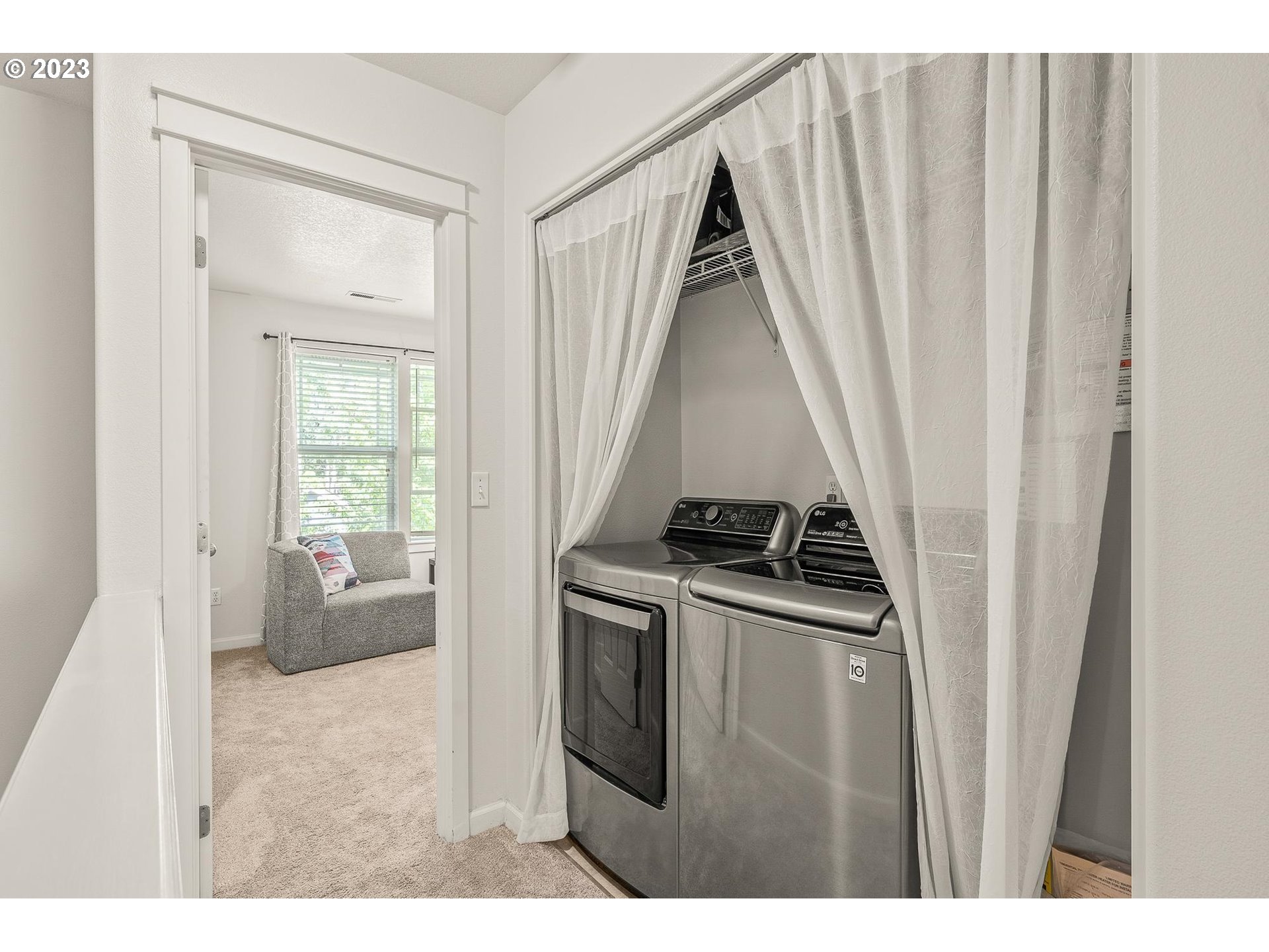 2830 Northeast Blossom Hill Road Fairview, OR 97024 - Photo 18 of 34 a view of kitchen and wooden floor