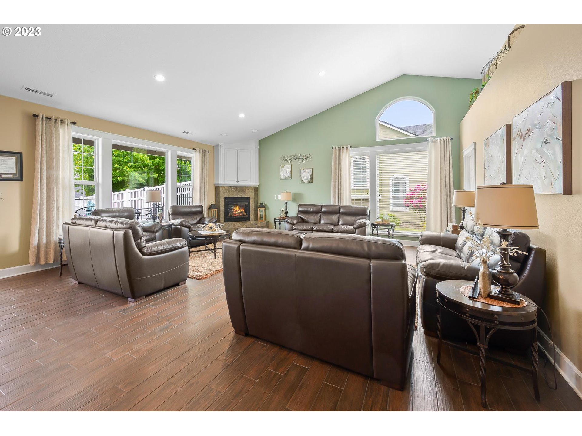2830 Northeast Blossom Hill Road Fairview, OR 97024 - Photo 29 of 34 a living room with furniture window and flat screen tv