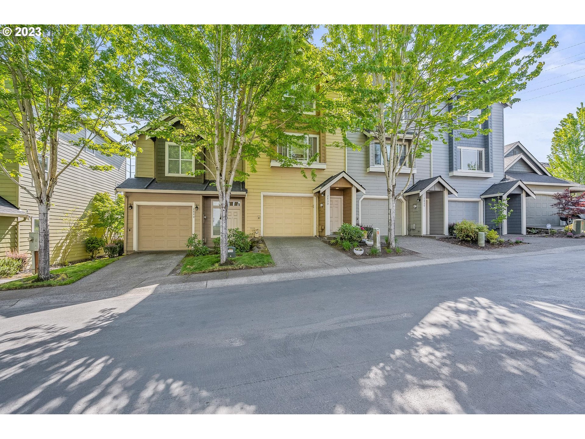 2830 Northeast Blossom Hill Road Fairview, OR 97024 - Photo 30 of 34 a front view of a house with a yard and garage