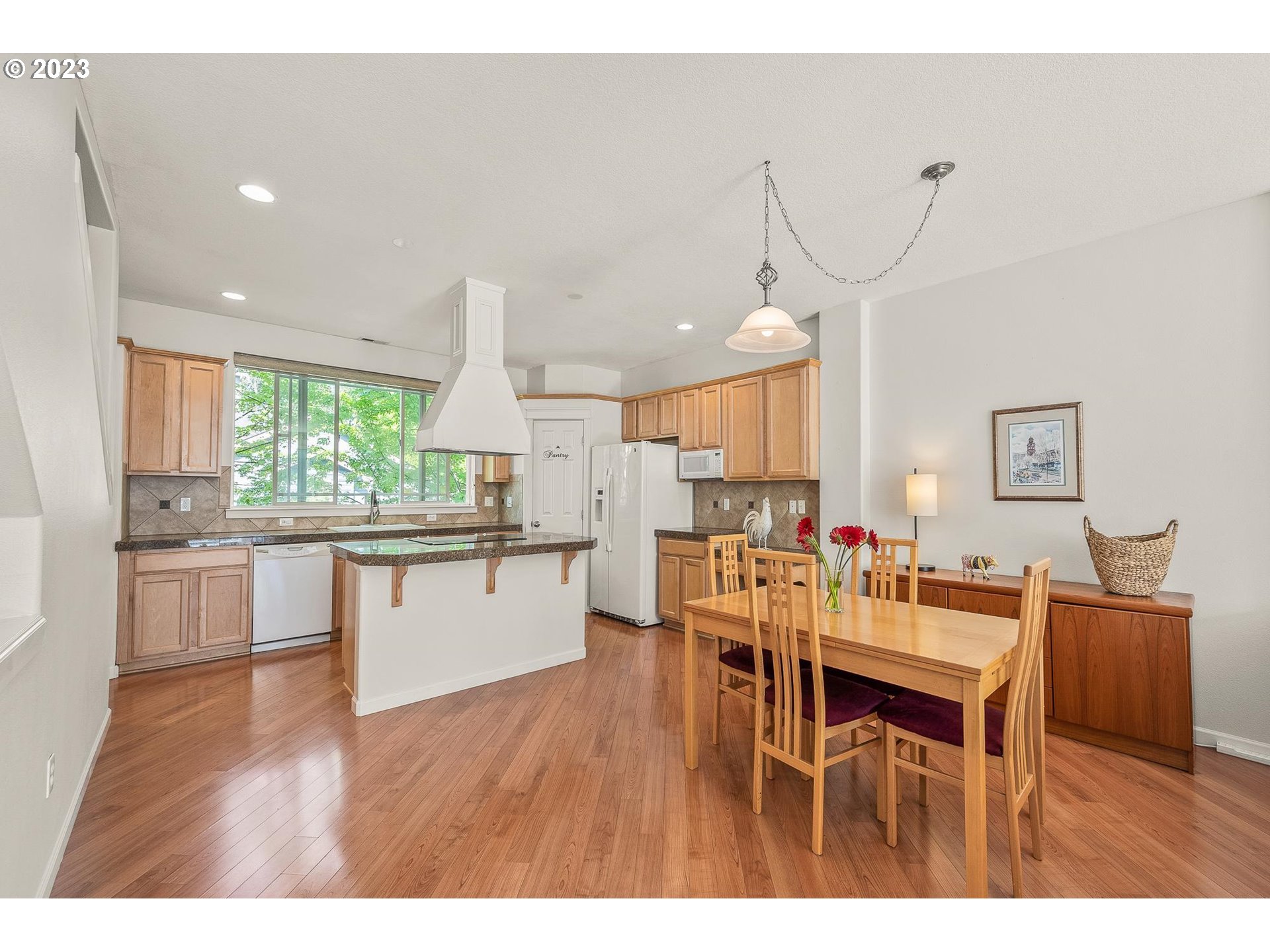 2830 Northeast Blossom Hill Road Fairview, OR 97024 - Photo 7 of 34 a open kitchen with a table and chairs in it
