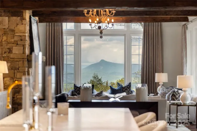 a dining room with table and chairs